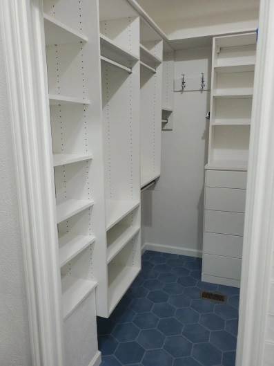 Custom walk-in closet in process. Bathroom renovation project in Buda, TX.